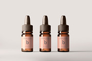 Amber Glass Dropper Bottle Mockups, a Cups & Container Mockup by pmvch (Thumbnail 12 of 20)