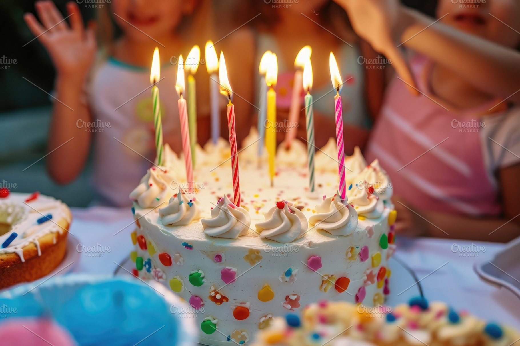 A festive birthday cake with brightl, a Photo by Iftikhar Alam