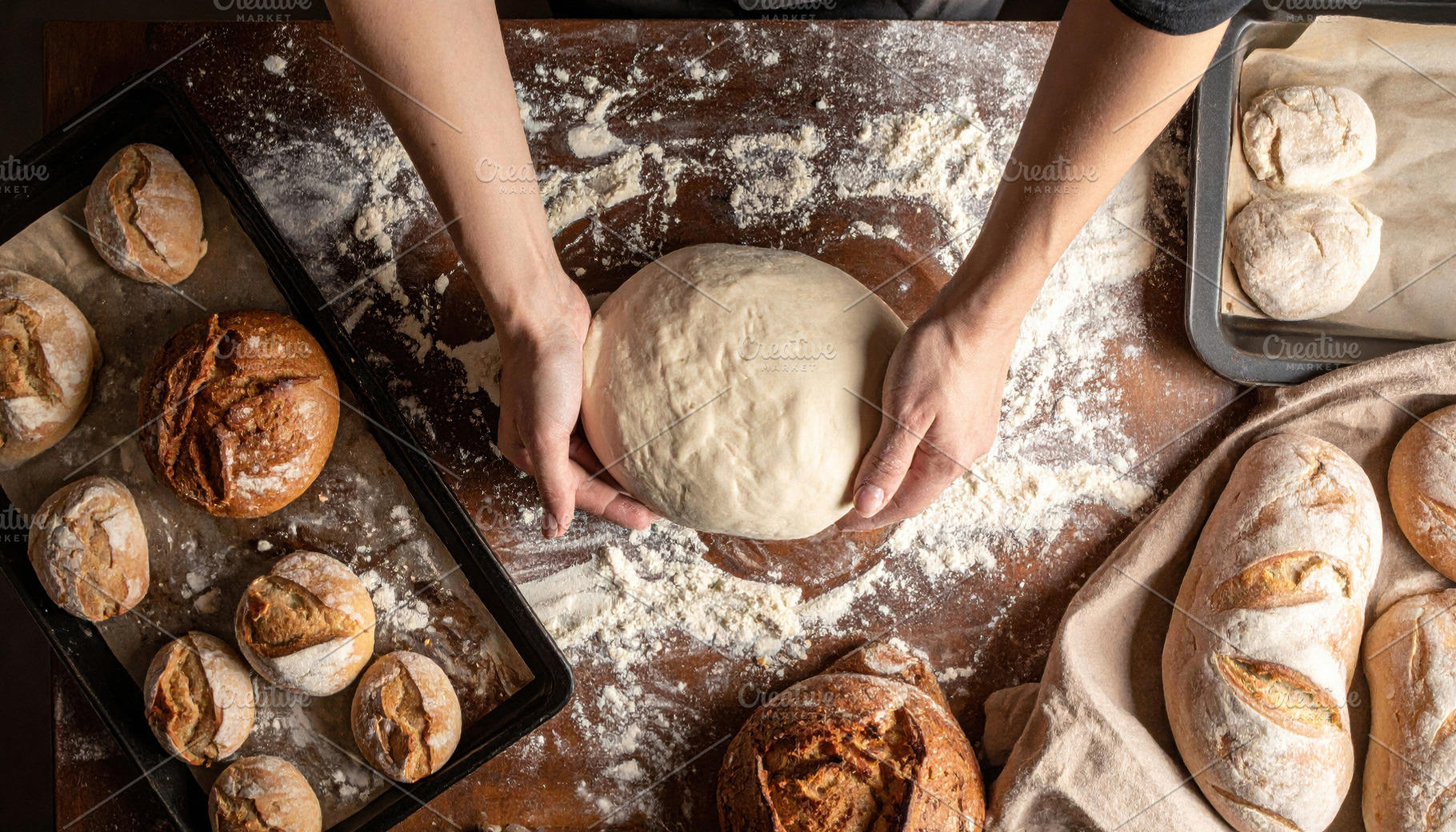 Hands Preparing Fresh Bread Dough Assortment, a Food & Drink Photo by Davizro's Market