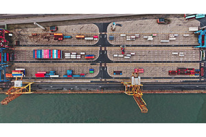 Aerial view showing shipping, a Transportation Photo by Goinyk