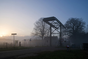 Drawbridge over a frozen canal, an Architecture Photo by John Stuij Photography