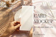 Card Mockup 4x9 Menu In Hand BP, a Product Mockup by PawMockups (Thumbnail 1 of 9)