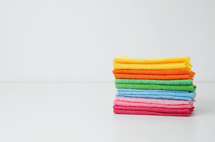 Colorful cleaning cloths neatly arranged, bringing brightness and energy to spr