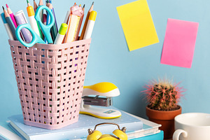 Student desk with school supplies and alarm clock, a School & Education Photo by Olena Rudo