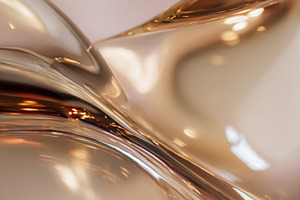 Fluid abstract metallic rose gold waves creating a smooth, gloss, a Photo by Studio ANNA