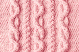 Pink knitting wool texture backgroun