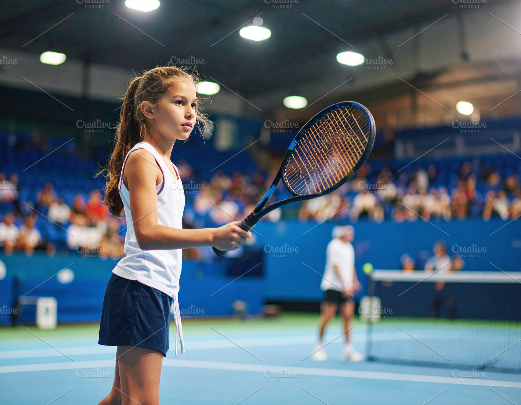 Young tennis player ready for serve, a Sports & Recreation Photo by DanFLCreativo