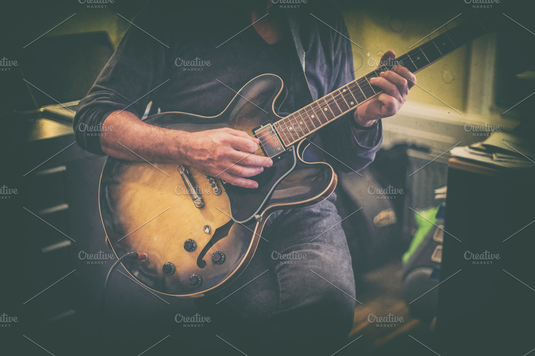 Man playing guitar stock photo containing vintage and retro, an Arts & Entertainment Photo by Patricia Hofmeester
