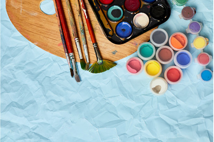 Flat lay of colorful paints, an Arts & Entertainment Photo by IlliaBondarPhotography
