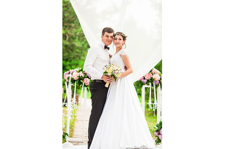 Wedding couple under the flower arch, a Person Photo by oksix