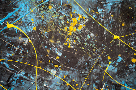 Black Wall with blue and yellow paint splashes, a Photo by andreonegin market