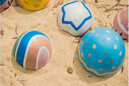 Multicolored eggs in the grass, a Holiday Photo by Elizaveta Galitskaya
