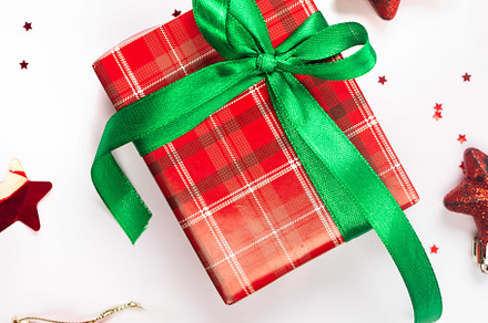 Christmas composition. Red gift boxes with green ribbon at white, a Holiday Photo by vimart