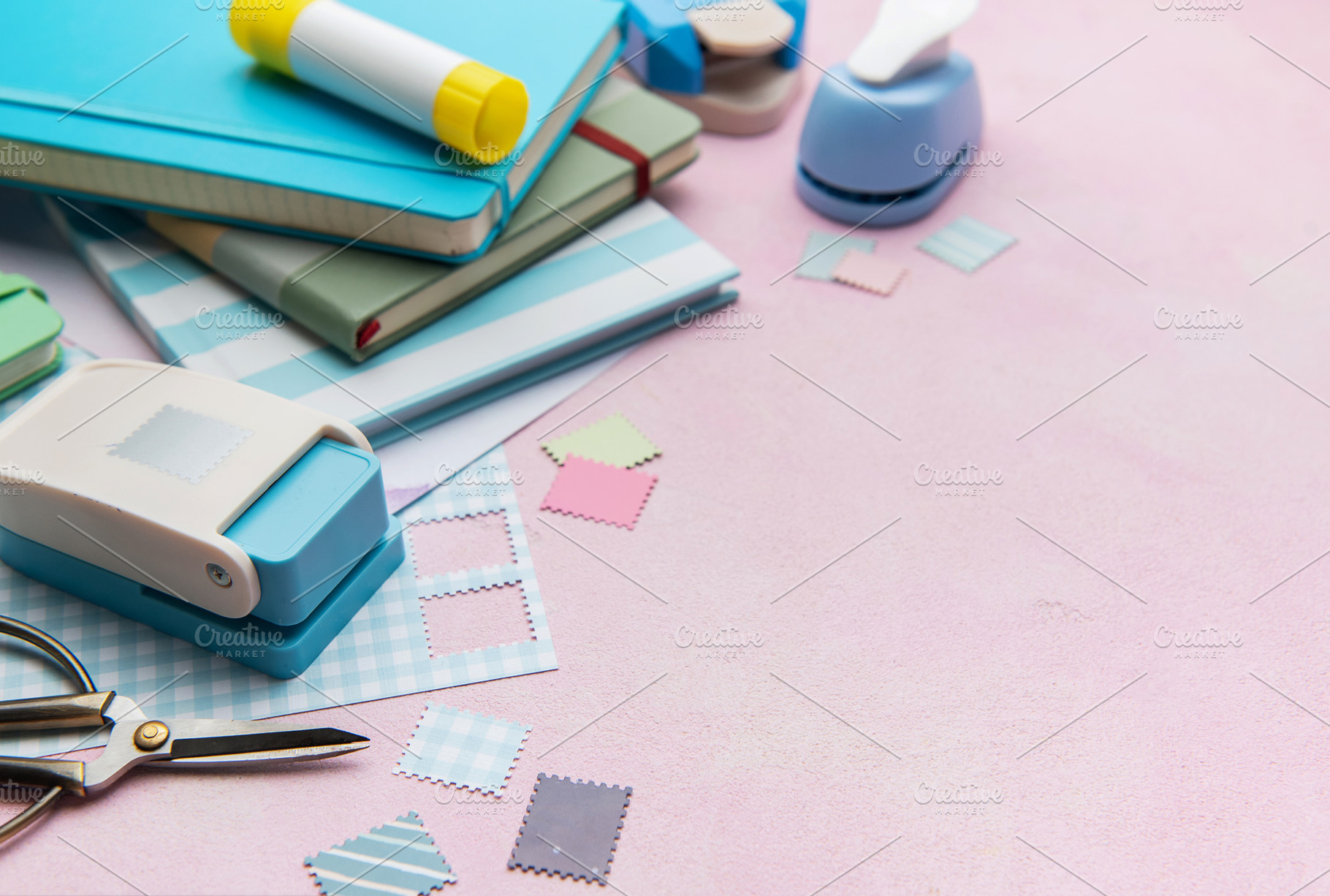 Scrapbooking set creating paper shapes on pink background, an Arts & Entertainment Photo by Olena Rudo