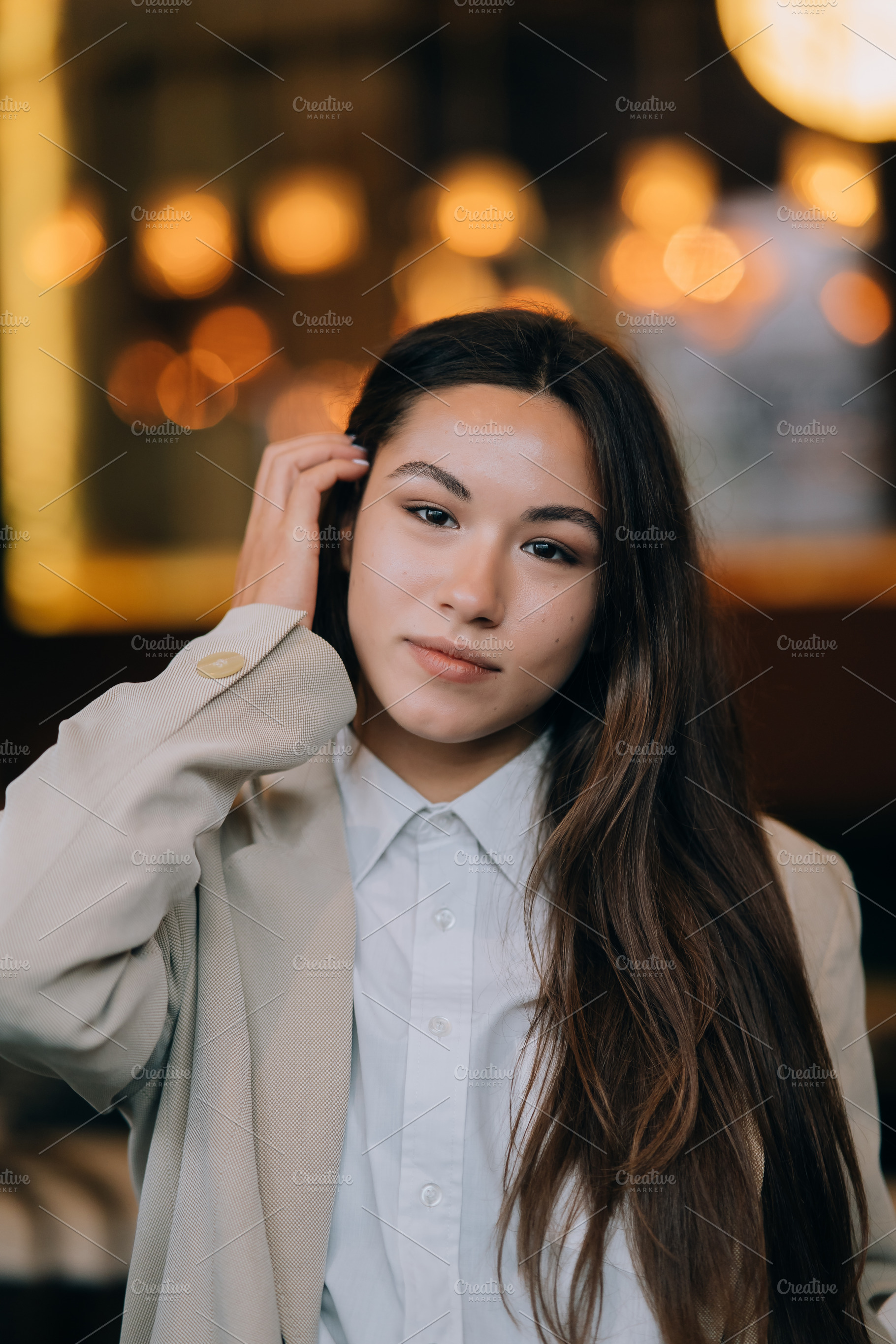 Headshot portrait of smiling young woman. Close up., a Person Photo by Tekso
