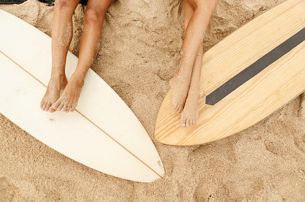 Beautiful girls with surf on beach containing sport, sea, and ocean, a Holiday Photo by Mikalai