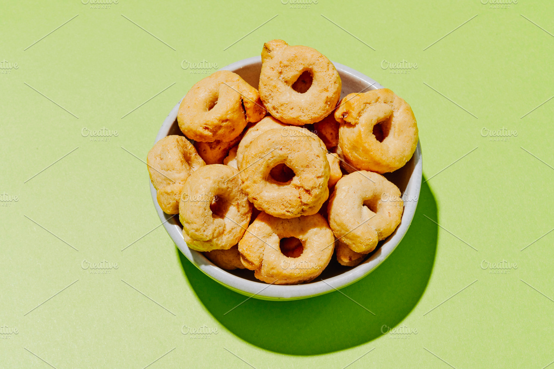 bowl filled with italian taralli with fennel seeds, a Photo by Nito