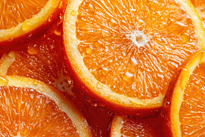 Fresh orange slices with water droplets, a Food & Drink Photo by AlyaAnd