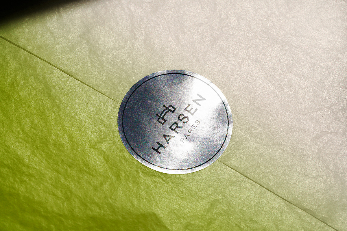 Logo Mockup Silver Sticker on Paper, a Product Mockup by Asylab (Photo 1 of 5)
