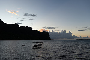 Sunset over the serene lagoon of Maupiti, French Polynesia, a Nature Photo by GoodGoods