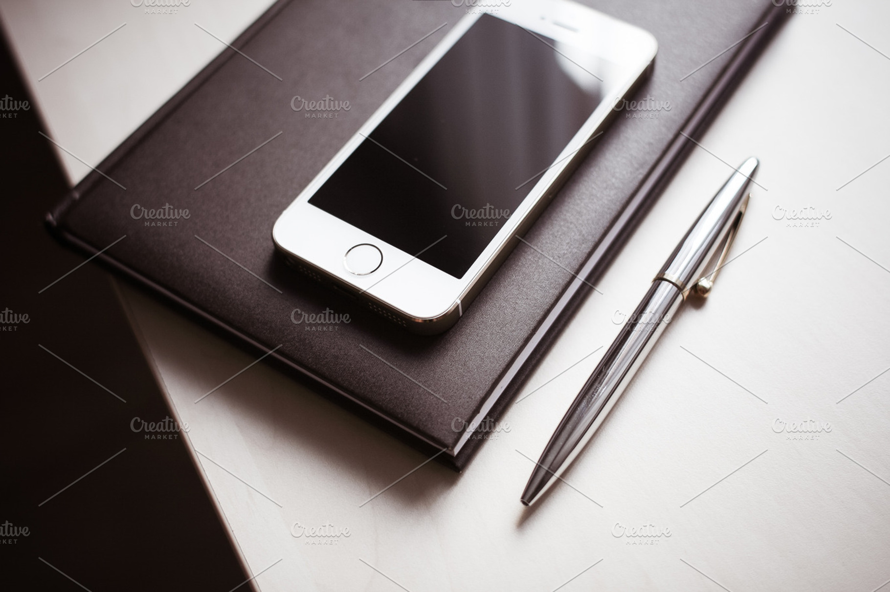 Iphone Diary And Pen Stock Photo