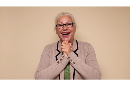 An elderly European woman is