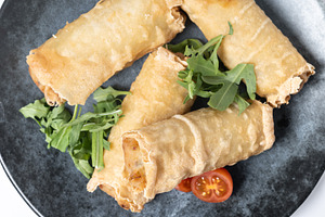 Crispy vegetables spring Rolls on Ceramic Plate isolated, a Food & Drink Photo by etorres69