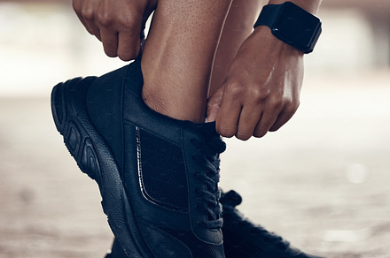 Running shoes, exercise and fitness woman with black sport shoe for training, workout and cardio outside. Closeup feet of female athlete or runner ready for run, walk or jog with sneakers or footwear, a Photo by Peopleimages.com