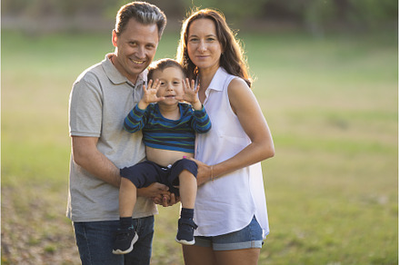 Cute white parents holding their, a Person Photo by Barcelona_dreams