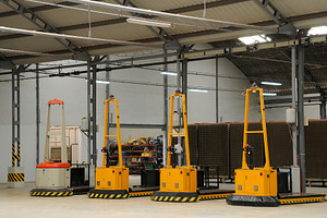 Autonomous Robots Operating in Industrial Factory Hall, an Industrial Photo by Davizro's Market