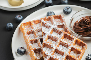 Belgium waffles Homemade waffles with strawberries, a Food & Drink Photo by Budarinphoto