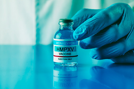 shows a vial of monkeypox vaccine, web banner, a Photo by Nito