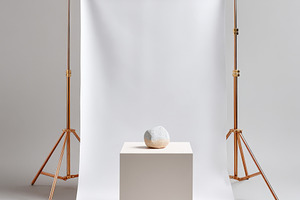 Minimalist studio setup with stone object, an Arts & Entertainment Photo by AlyaAnd