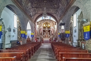 Interior of ornate catholic church with symmetrical pews, an Architecture Photo by DanFLCreativo