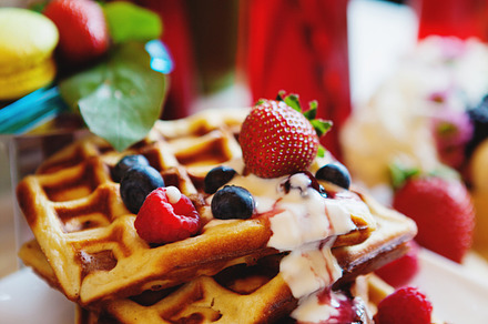 Summer breakfast featuring waffles, breakfast, and berry
