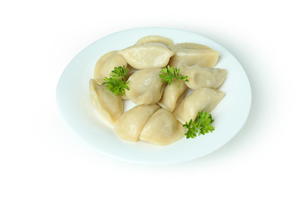 Plate of vareniki or pierogi isolated on white background, a Food & Drink Photo by AtlasStudio PRO