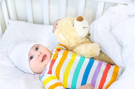 The baby in the crib goes to bed, a Person Photo by yanadjana