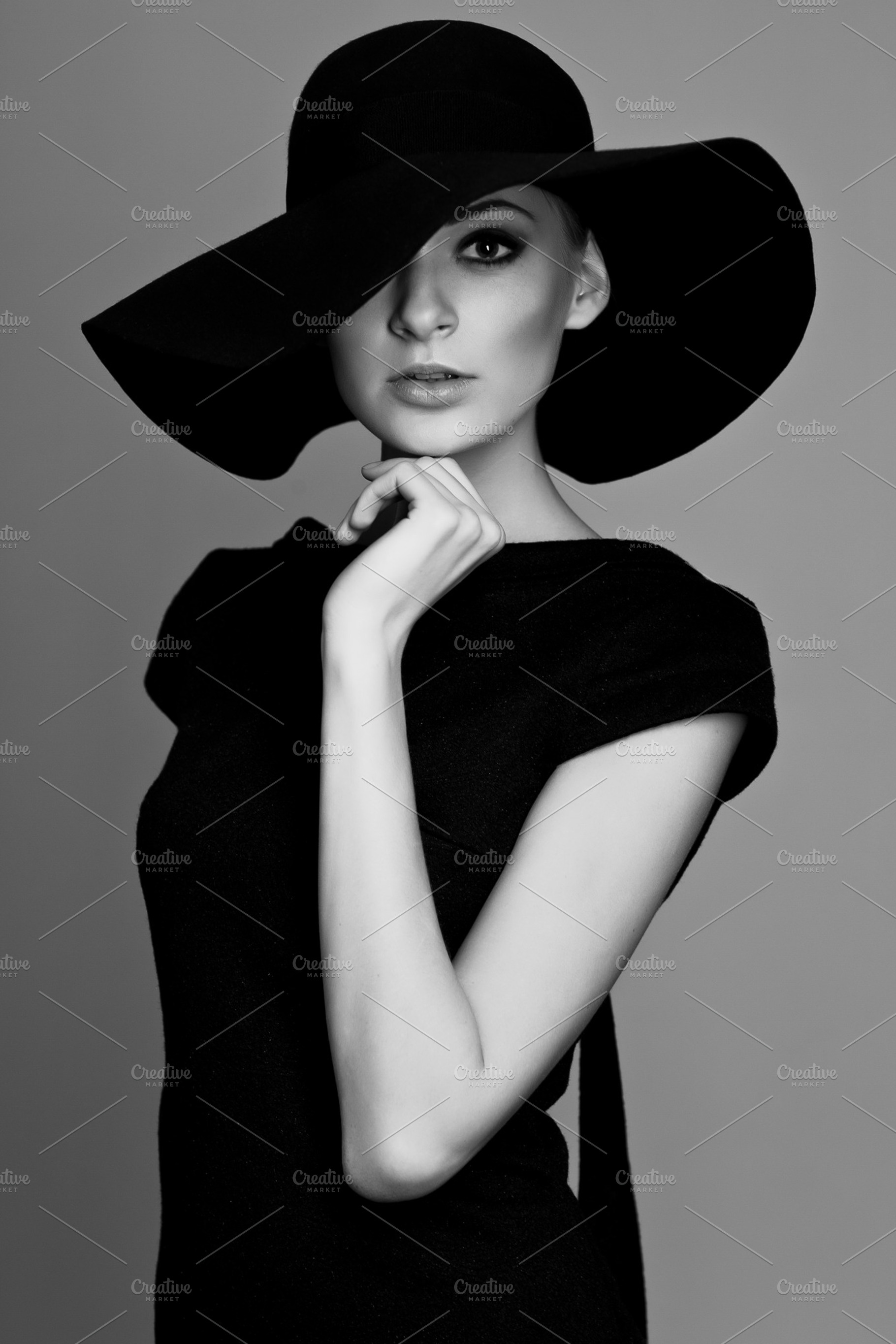 Woman retro fashion portrait containing black, white, and hat, a Beauty & Fashion Photo by MaxFrost