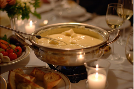 Gourmet cheese fondue dinner setting, a Food & Drink Photo by Ylivdesign