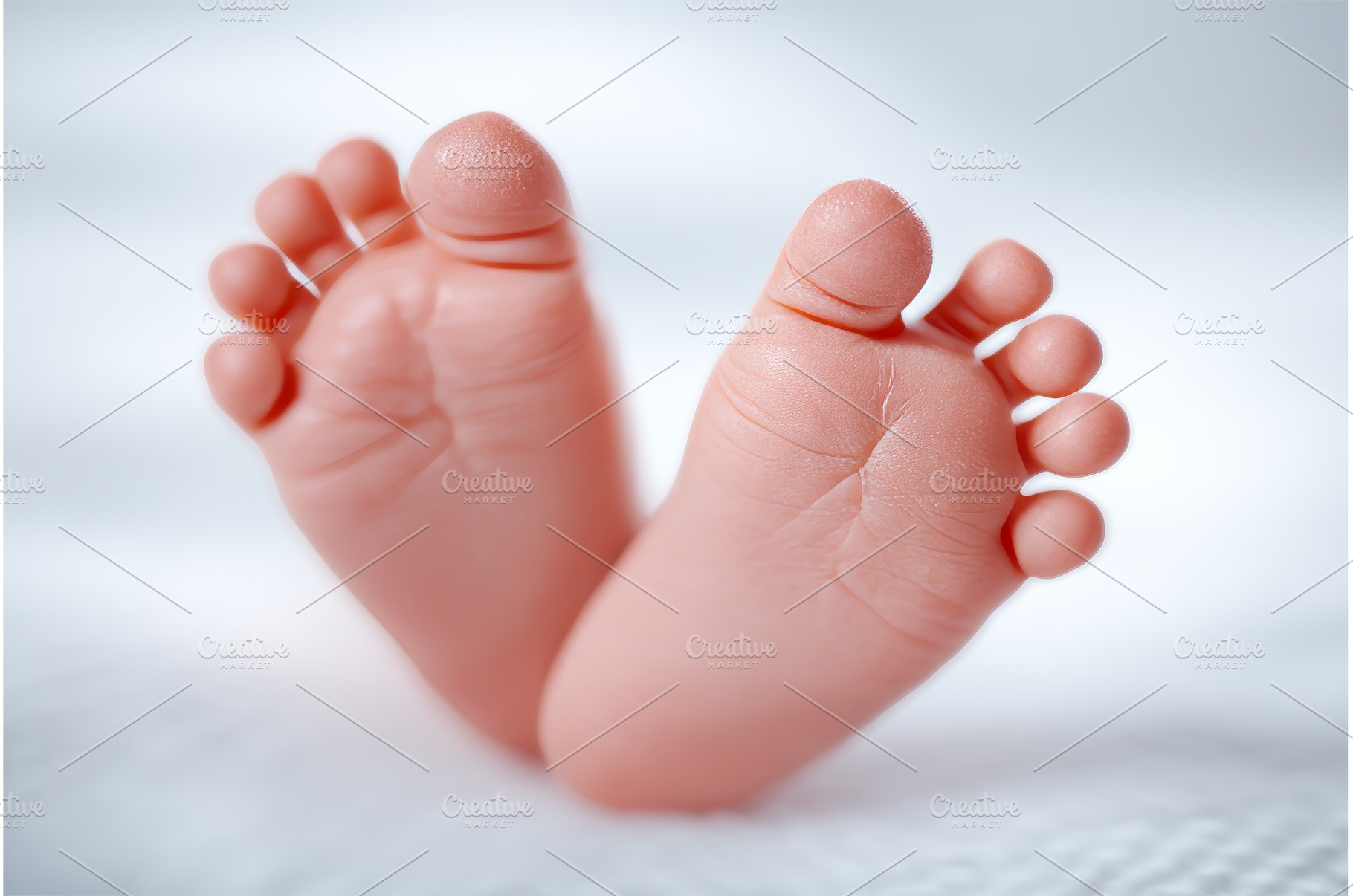Newborn baby's tiny feet come into, a Person Photo by ZinetroN
