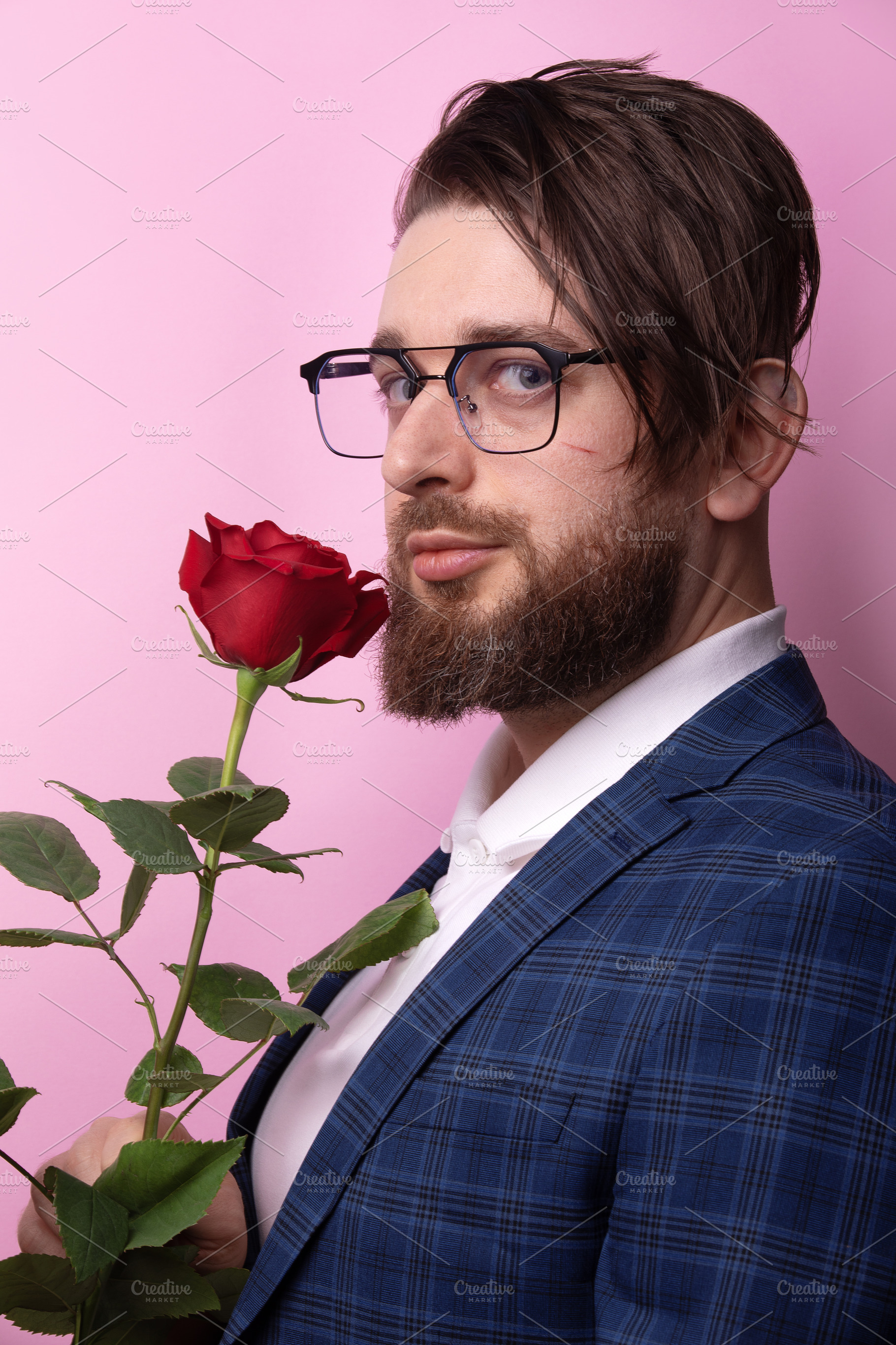 Man with Rose on Pink Background, a Person Photo by Ales Munt