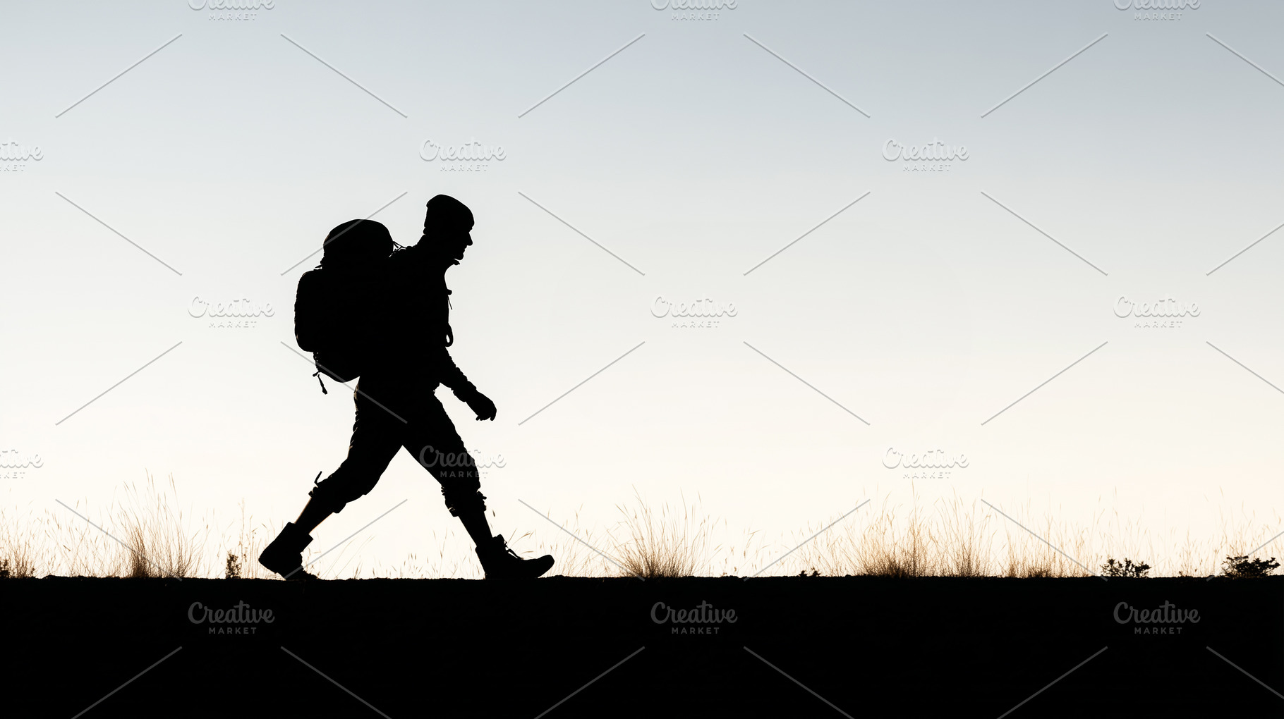 Silhouette of a hiker walking with, a Sports & Recreation Photo by MistyDay
