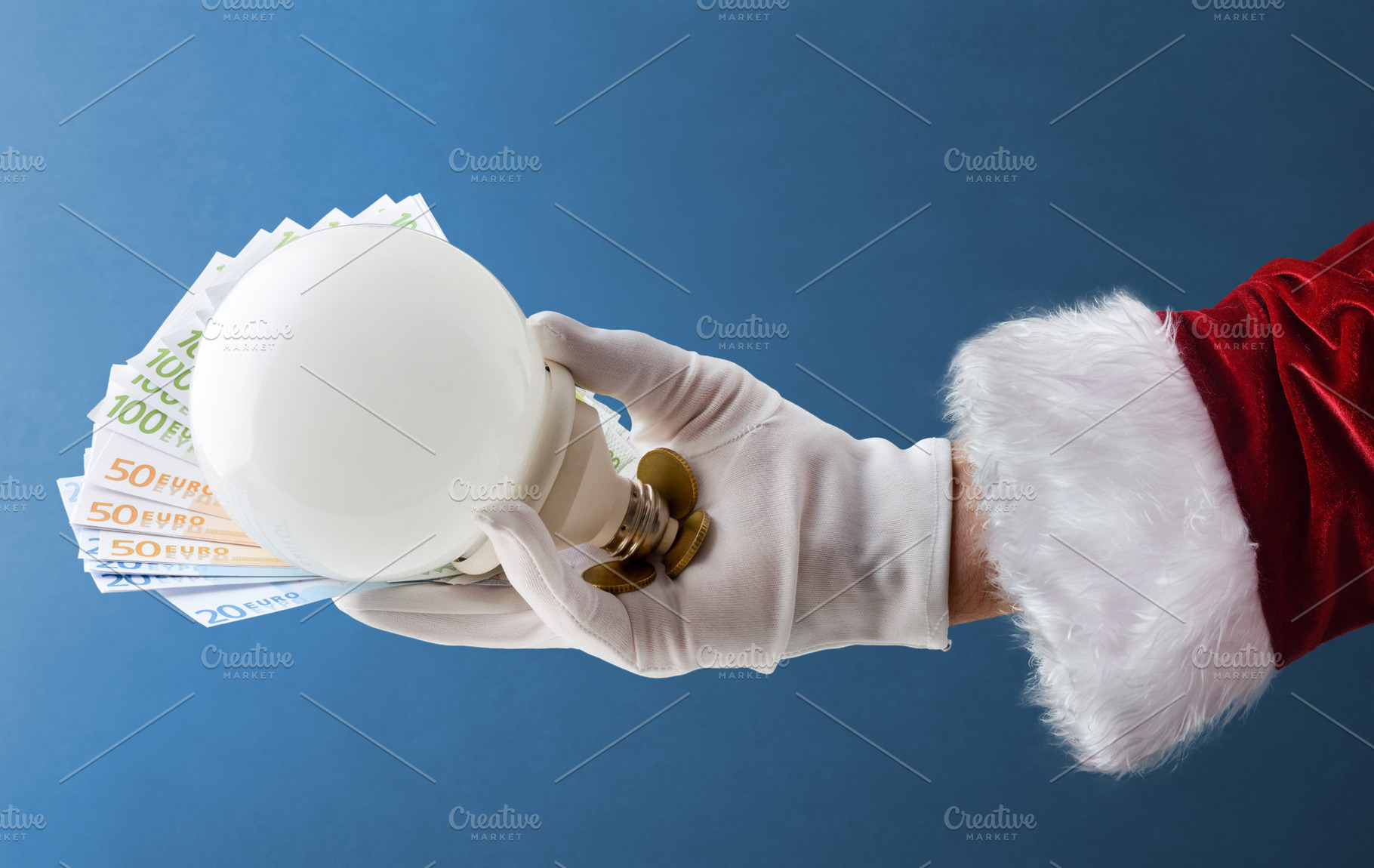 Concept of energy cost at Christmas with Santa's hand, a Business Photo by Davizro's Market