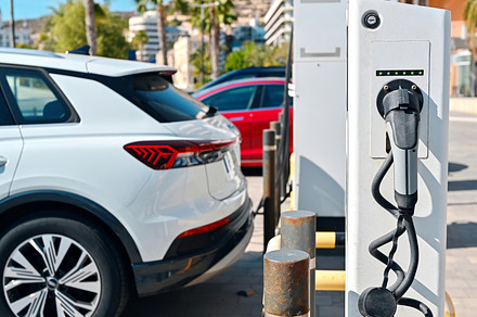 Electric car charging at the chargi
