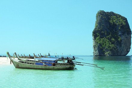 A Wooden Boat Floating On The Sea preview 6