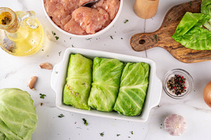 Cooking making cabbage rolls with chicken meat, a Food & Drink Photo by Rimma
