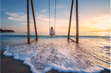 Happy young woman on wooden swing in, a Person Photo by den-belitsky