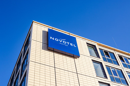 Novotel suites logo at hotel building in Munich, an Architecture Photo by Dvoevnore photos