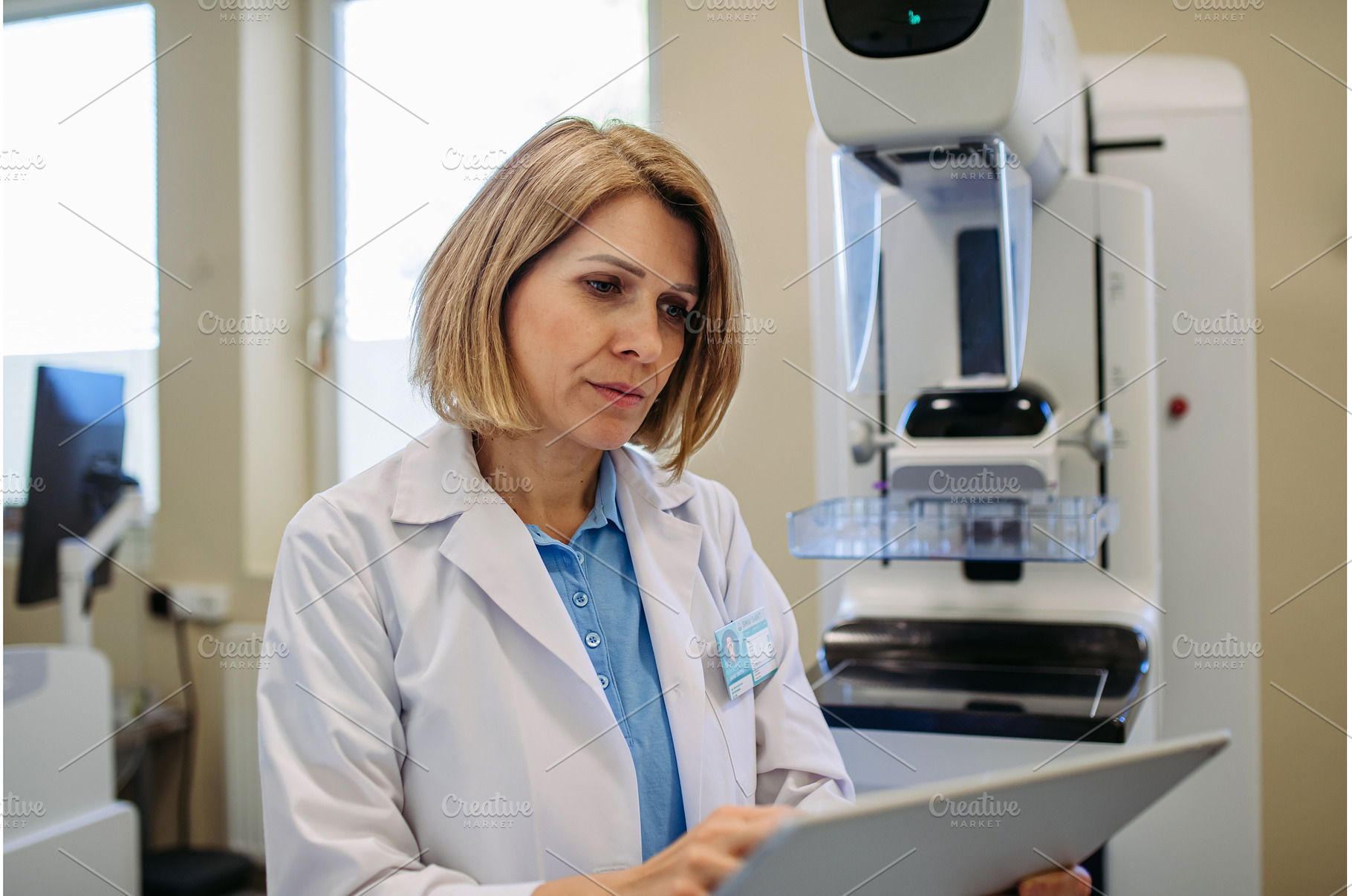 Female doctor preparing for breast, a Person Photo by HalfPoint