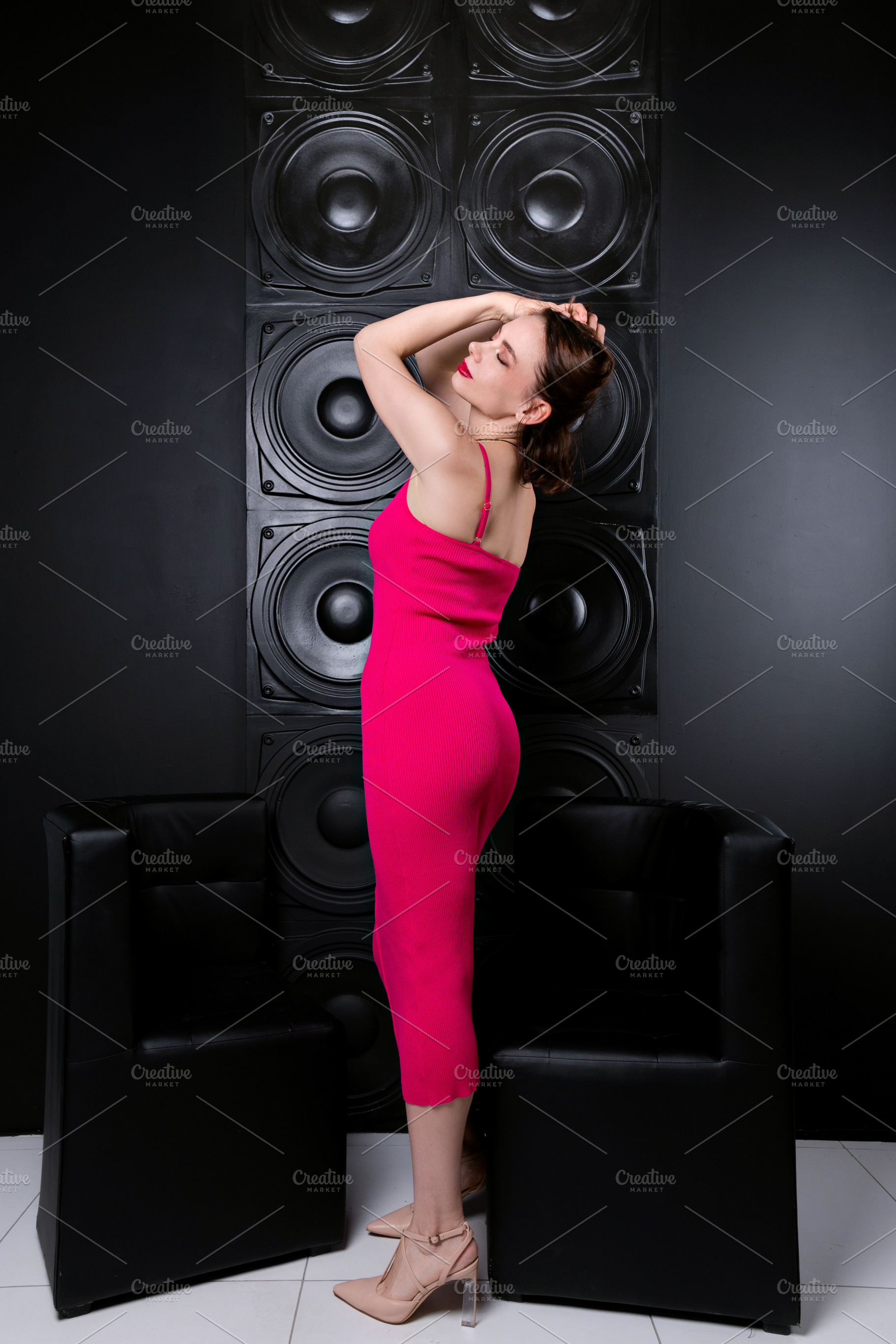 Woman posing in pink dress indoor, a Person Photo by Elena Vagengeim